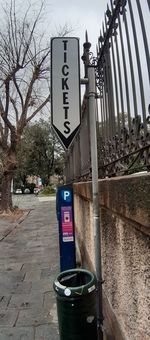 Information sign on road by street