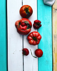 Directly above shot of tomatoes on wooden table