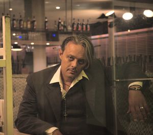 Portrait of man looking at camera