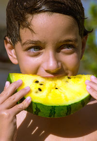 Portrait of smiling man eating food