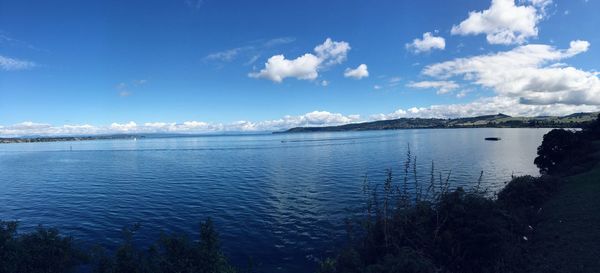 Scenic view of sea against cloudy sky