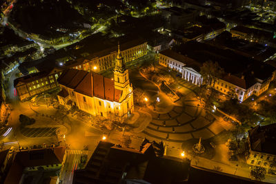 Low angle view of illuminated buildings at night