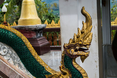 Buddha statue in temple outside building