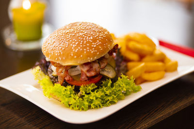 Close-up of burger in plate on table