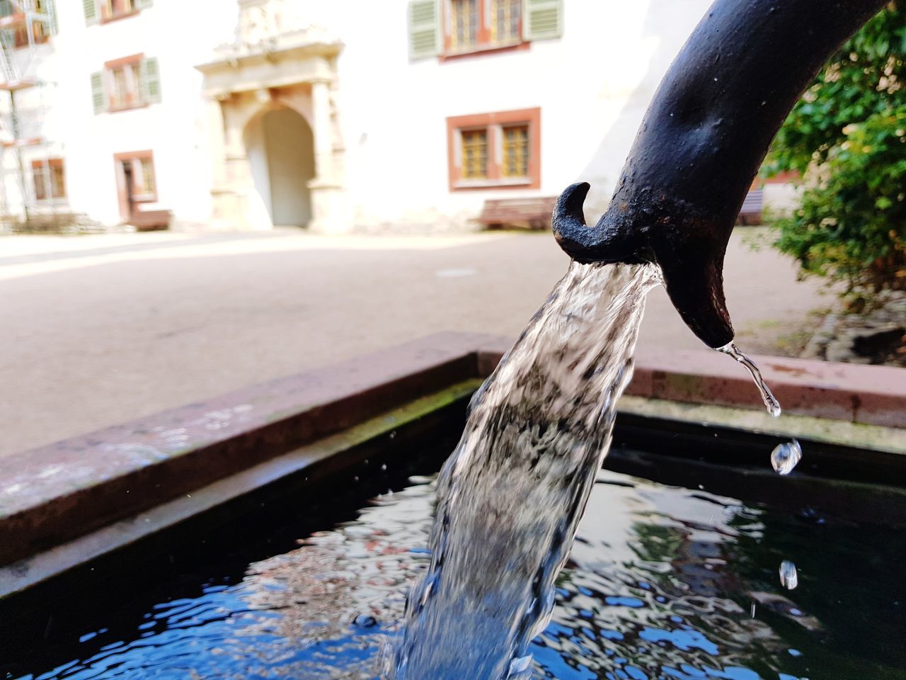 CLOSE-UP OF FOUNTAIN ON WATER