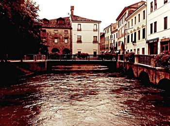 View of canal in city