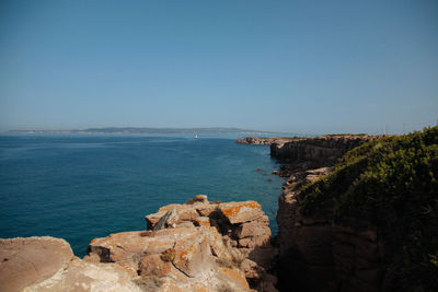 Scenic view of sea against clear sky