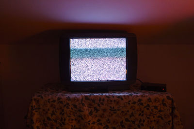 Close-up of tv at home