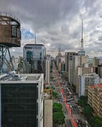 View of buildings against cloudy sky