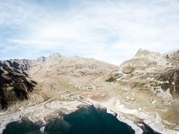 View of mountain range against cloudy sky