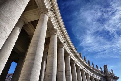 Low angle view of historical building against cloudy sky