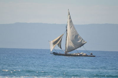 Boat sailing in sea