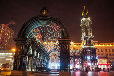 Illuminated buildings in city at night