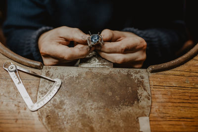 Close-up of man working on table