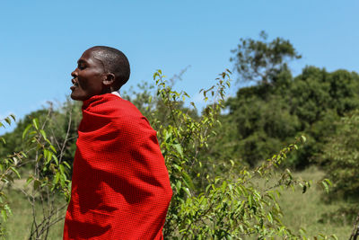 Woman standing on field