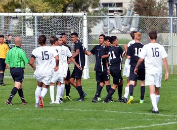 Group of people on soccer field