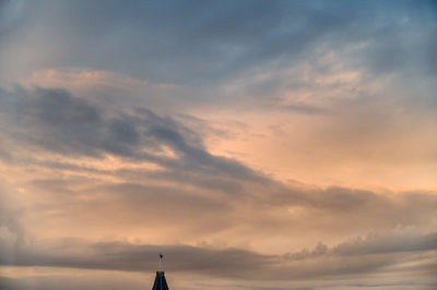 Low angle view of dramatic sky during sunset