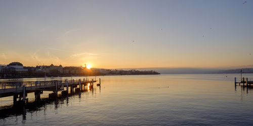 Scenic view of sea against sky during sunset