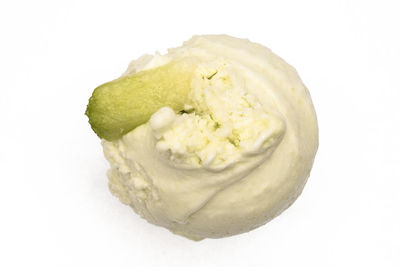 Close-up of ice cream over white background