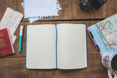 High angle view of open book on table