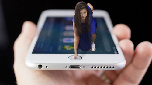 Woman photographing through smart phone