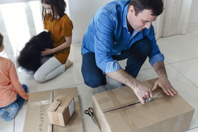 High angle view of man working at home