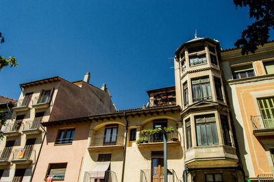 Low angle view of building against blue sky