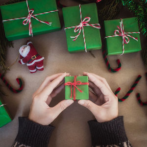 High angle view of woman with christmas decorations