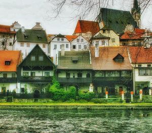 View of canal with buildings in background