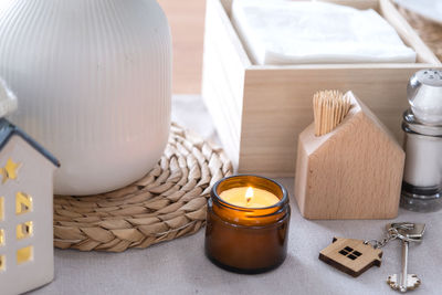 Close-up of tea light bulb on table