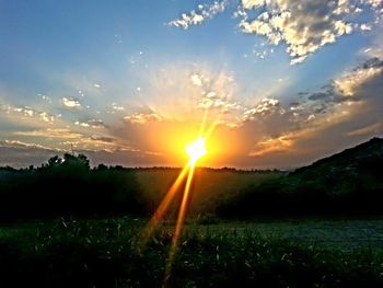 Sun shining through clouds