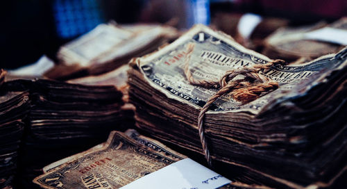 Close-up of old objects on table