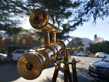 Close-up of clock tower against sky in city