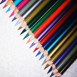 Close-up of colored pencils on table