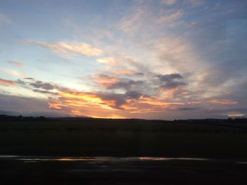 Scenic view of silhouette landscape against sky during sunset