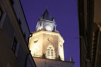 Low angle view of clock tower against sky