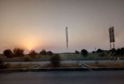 Scenic view of river against sky during sunset