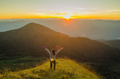 Rear view of woman on mountain