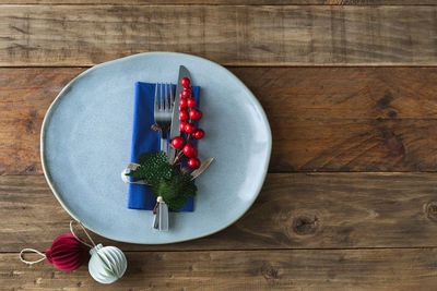 High angle view of fruits in plate on table