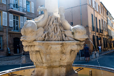 Statue of fountain in city