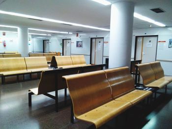 Empty chairs and tables at airport