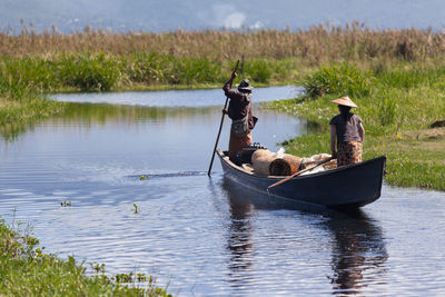 Man in boat on lake