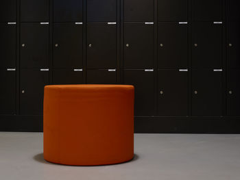 View of orange table against wall