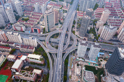 High angle view of street amidst buildings in city