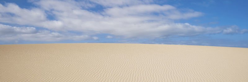 Scenic view of desert against sky