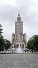 Low angle view of fountain against sky