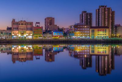 Reflection of skyscrapers at waterfront