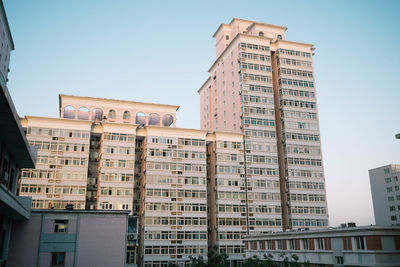 Low angle view of buildings against sky