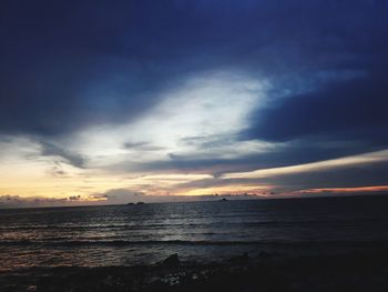 Scenic view of sea against sky at sunset