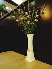 Close-up of potted plant on table at home